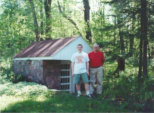 By the cabin spring house